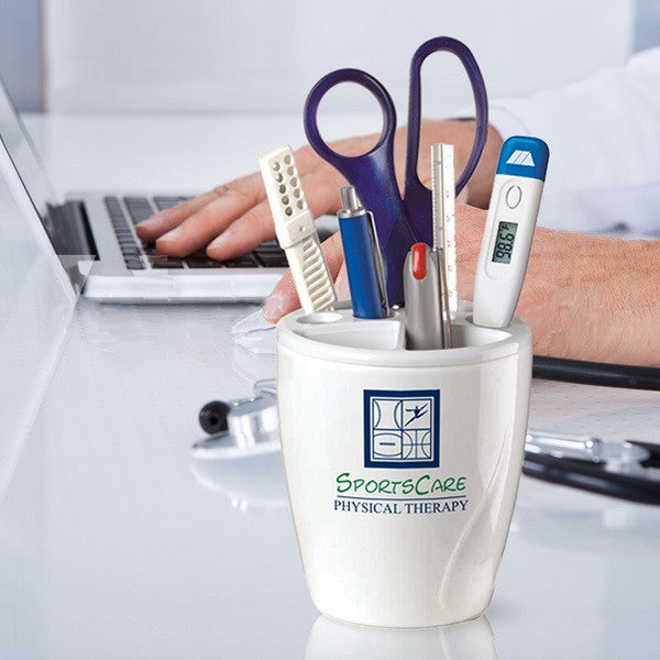 White desk top organizer with logo in use